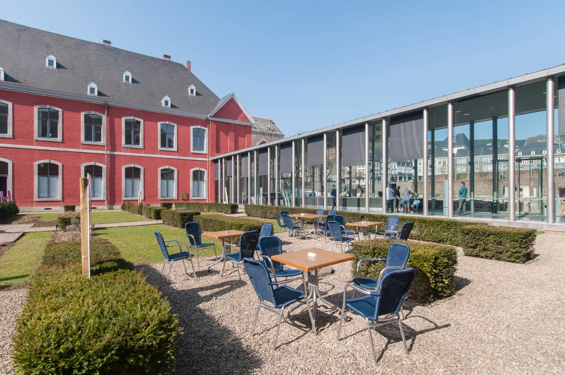 Abbaye de Stavelot courtyard and museum buildings in bright daylight