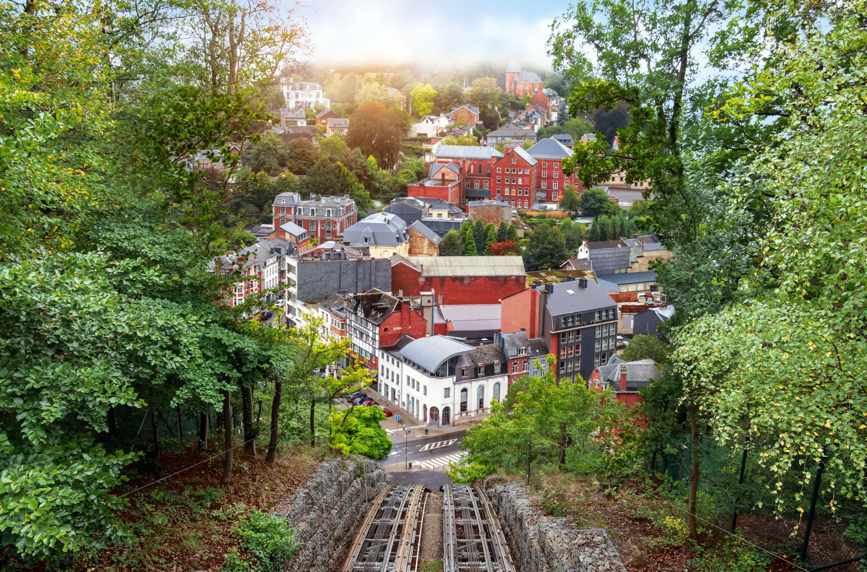 View down into the town of Spa through the trees